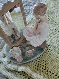 Lladro 1411 Day Dreamer--Norman Rockwell series. 