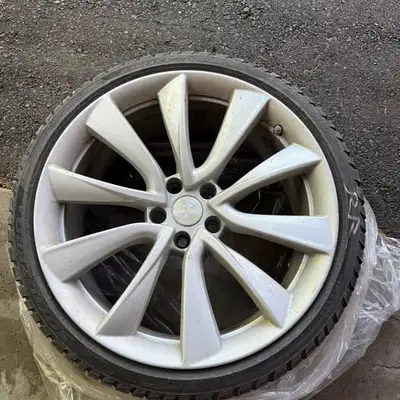 Sottozero 3 Winter tires for Tesla Model 3 sedan (Pirelli) 20" performance rims specs on tire: 235/3...
