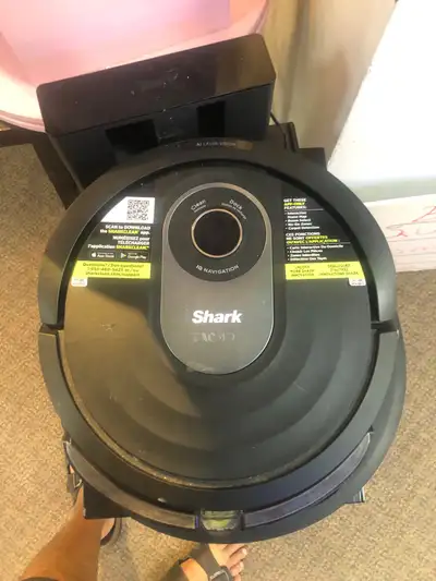 This pre-owned Shark AI Robot Vacuum with IQ Navigation is ready to keep your floors spotless, offer...