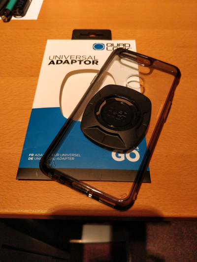 Perfect condition Clear case with slightly blackened edges all around Quad Lock adapter permanently...