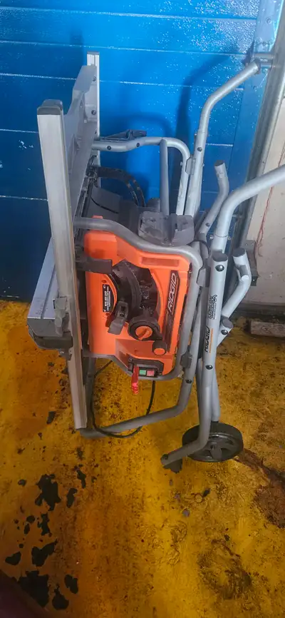 Ridgid folding table saw with wheels 10 inch blade Was never used and just sat in the garage. Sellin...