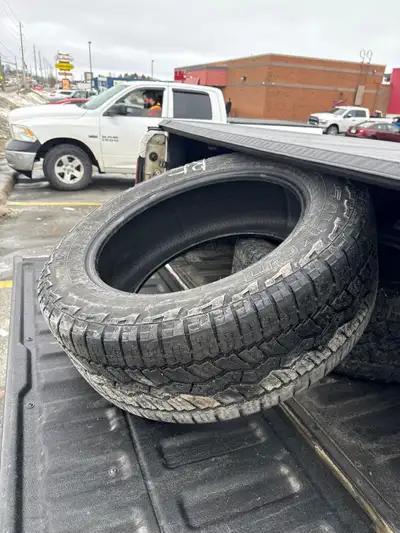 Ram 1500; 4 X Used Tires Size 275/55R20 with no rims Falken All Weather Snow Rated in a very good co...