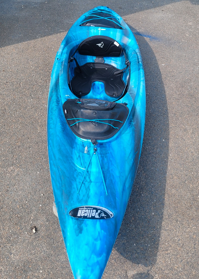 Pelican 10ft Kayak with paddle and vest. Water Sports Fredericton
