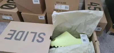 Yeezy Slide Glow Green size 12 brand new (won on CONFIRMED), View more