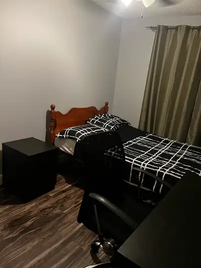 This furnished single room offers a comfortable living space with access to shared common areas, per...