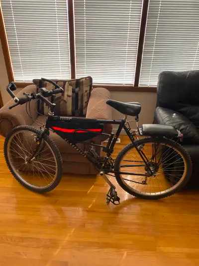 Older Rocky Mountain. In good condition. 21 spd, 26 inch tires. Shifts and brakes good. Comes with K...