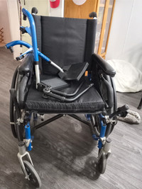 Titanium wheelchair, has all the bells and whistles 