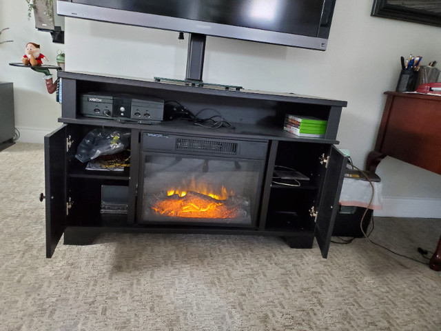 Tv console with electric fireplace. in TV Tables & Entertainment Units in Edmonton - Image 2