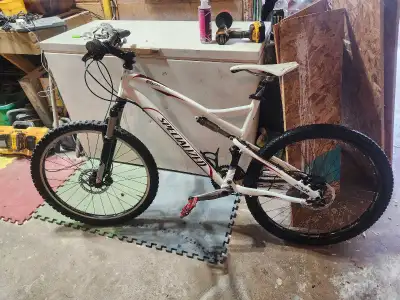 I am selling a Specialized Epic Expert FSR mountain bike, perfect for tackling trails with its full...