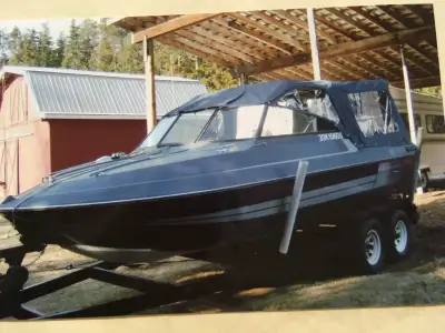 21' Aluminum jet boat. Step thru windshield (18" wide), teflon bottom, kick clean out grate, 454 inb...
