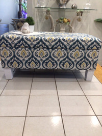 Beautiful reupholsterd Ottoman coffee table with storage 