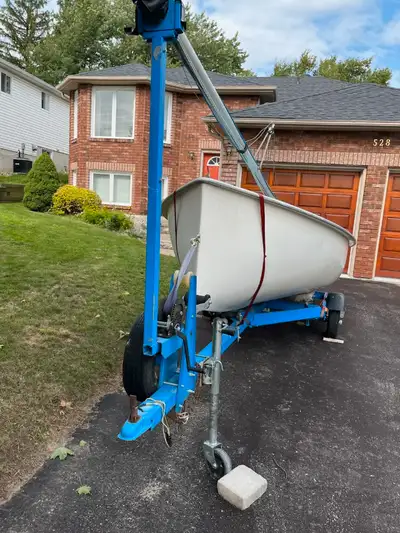 14 ft Albacore sailboat, sturdy and fully rigged, with trailer.