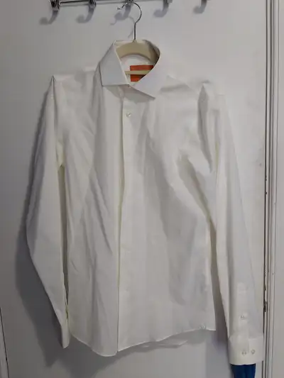 I am selling a Brand New with Tags Men's Dress Shirt. This shirt is ivory (off-white) and it is long...