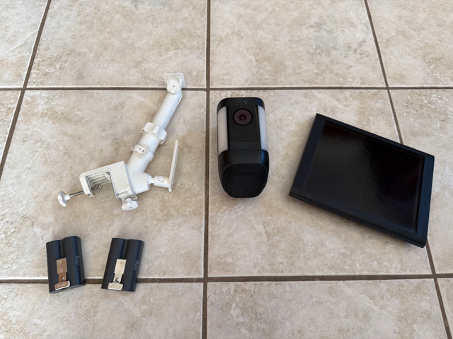 Ring Spotlight Cam Pro Solar with extra battery and gutter mount in Security Systems in Markham / York Region