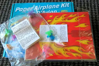 Creative Funworks Paper Airplane Kit, in good condition but is an incomplete set. Includes 12 sheets...