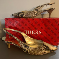  Guess snakeskin heels. New in the box