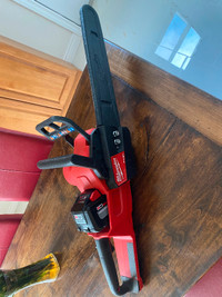 Milwaukee chainsaw and 12amph battery 600$ OBO