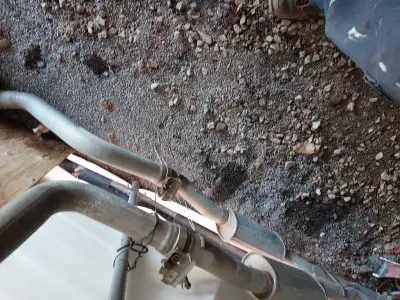 Stock exhaust for a 2021 5.7L engine with chrome tips ($800) and a stock engine cover for a 5.7L hem...
