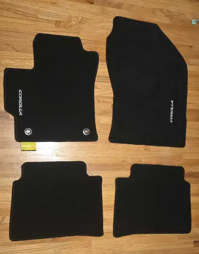 *Brand New* Set of 4 genuine carpeted floor mats for a Toyota Corolla. I believe they fit years 2020...