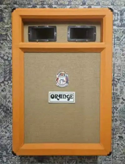 1970's Orange speaker cab. In mint shape. Comes loaded with vintage G12T-75 speakers, wired for 8 oh...