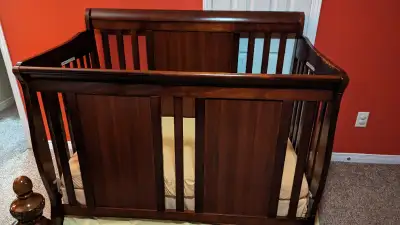 325 or best offer Cherry color solid-wood baby crib. Mattress and cover. Crib Bumper. Nursing Pillow...