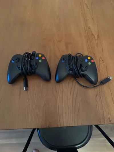 They are third party Xbox 360 controllers. Nothing wrong with them and work great. Price is 20 for b...