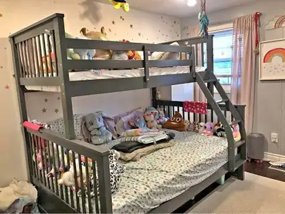 This sturdy bunk bed is perfect for kids or adults, offering a space-saving sleep solution that does...