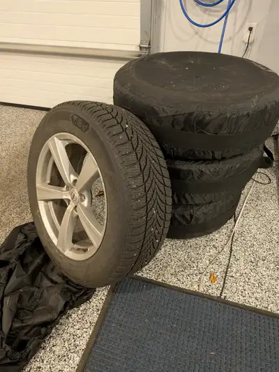 Set of 4 winter tires including rims. Very good tread. Size is 235/60R18 Must pick up, we will not d...