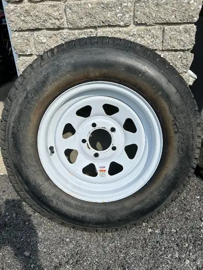 Selling mainly for the rim, tire has never been used as far as I can tell, but is quite old as was t...