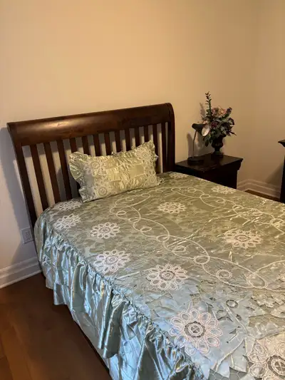 Welcome to a cozy room featuring a comfortable twin bed, perfect for a single occupant. The room is...