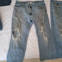 Two pair of experienced jeans.