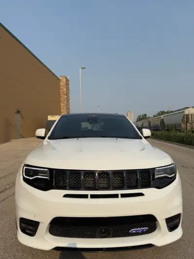 2017 Jeep Grand Cherokee SRT 6.4L HEMI V8 - 475HP. Rebuilt title from very minor front end damage. A...