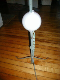 lightning rod with braided copper stand and milk glass ball