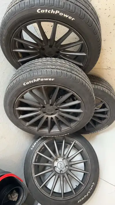 20” niche rims on all season tires with 80 percent thread 5 bolt pattern - 245/45/r20