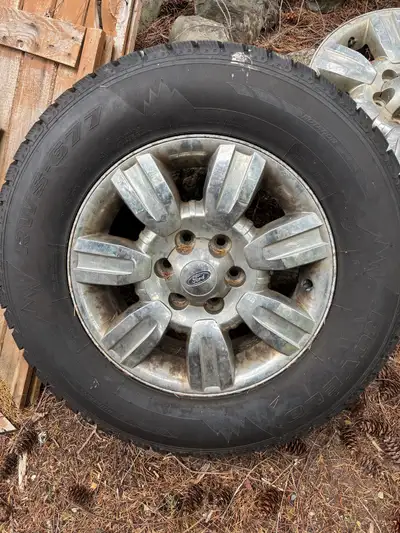 4 - 18 inch rims of F150. 4 - tire pressure monitors 2 - 275 65 18 winter tires never used. Reason f...