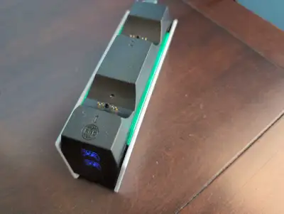 Charge up to two PlayStation 5 DualSense controllers simultaneously with this sleek charging station...