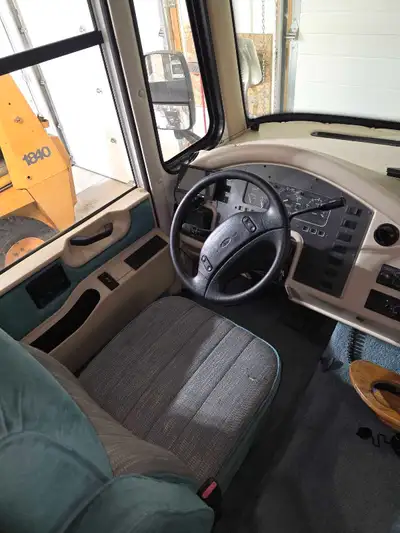 1997 34' Dutch Star motorhome. Has a Ford 460 gas engine 90,000 km ,one large slide.