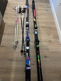 Rossignol downhill skis with poles
