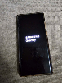 Samsung s22 ultra. Small Crack top right with 2 lines in middle.