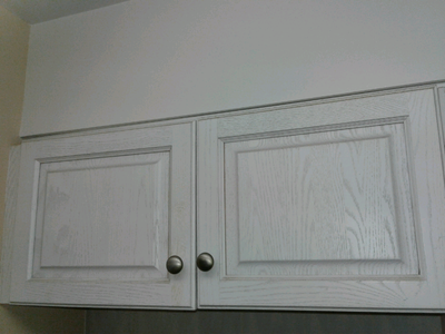 A pair of kitchen cabinet doors with hinges and knobs $35, View more