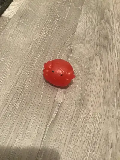 This gently enjoyed red axolotl squishy toy is a delightful find for collectors and kids alike! It's...