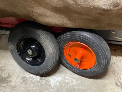 Wheelbarrow wheels rebuilt,…. Painted, new tubes and the black wheel has new bearings. $25.00 each N...