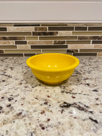 Yellow plastic bowl 