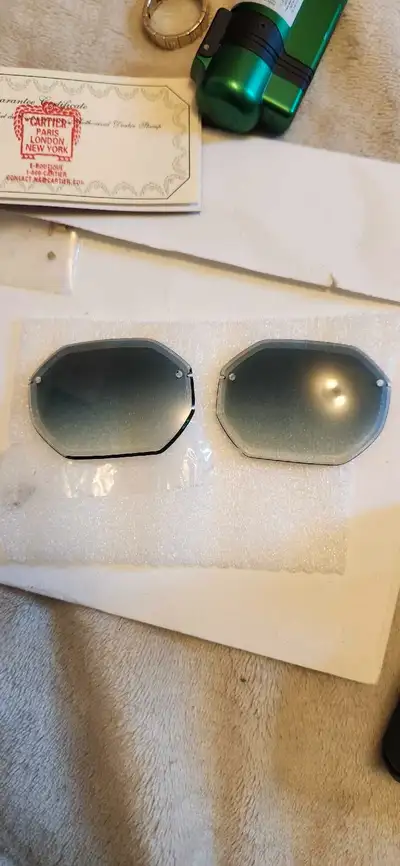 Selling the original hexagonal lenses that came with the green Cartier woods, I switched them out so...
