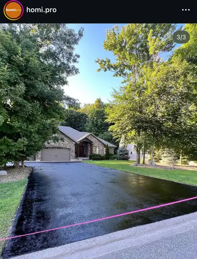 647-874-8479 or Homipro.com ✨ Give your driveway the matte black makeover it deserves — no cheap shi...