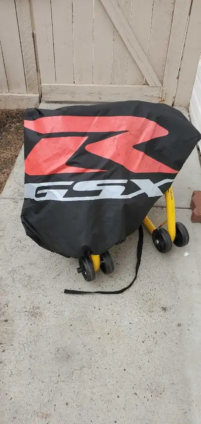 Sport bike stands. 30.00 GSXR Bike cover. 40.00 Both used previously 02 gsxr 1000 Pick up west end.