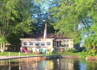 Cozy, west facing Cottage on Mississippi Lake. Enjoy swimming, boating,fishing, great views, and lei...