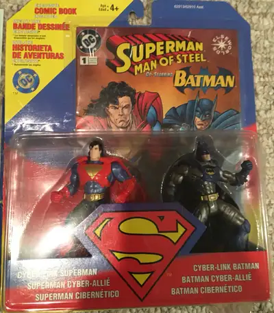 Sealed 1995 Superman and Batman Cyberlink Action figures along with Marvel and Wizard Comic Cards. T...