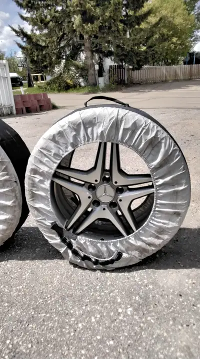 Winter Tires and rims for a mercedes benz with carrying storage bag's. $1.200 or best offer...