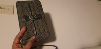 Coach wristlet/wallet price is firm
